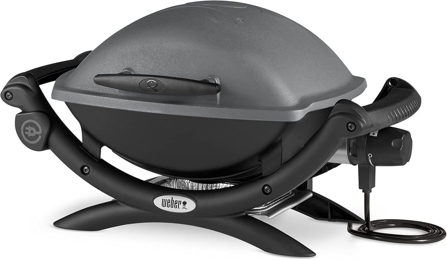 Barbacoa eléctrica Weber Q1400 gris oscuro sobre una mesa, ideal para balcones.